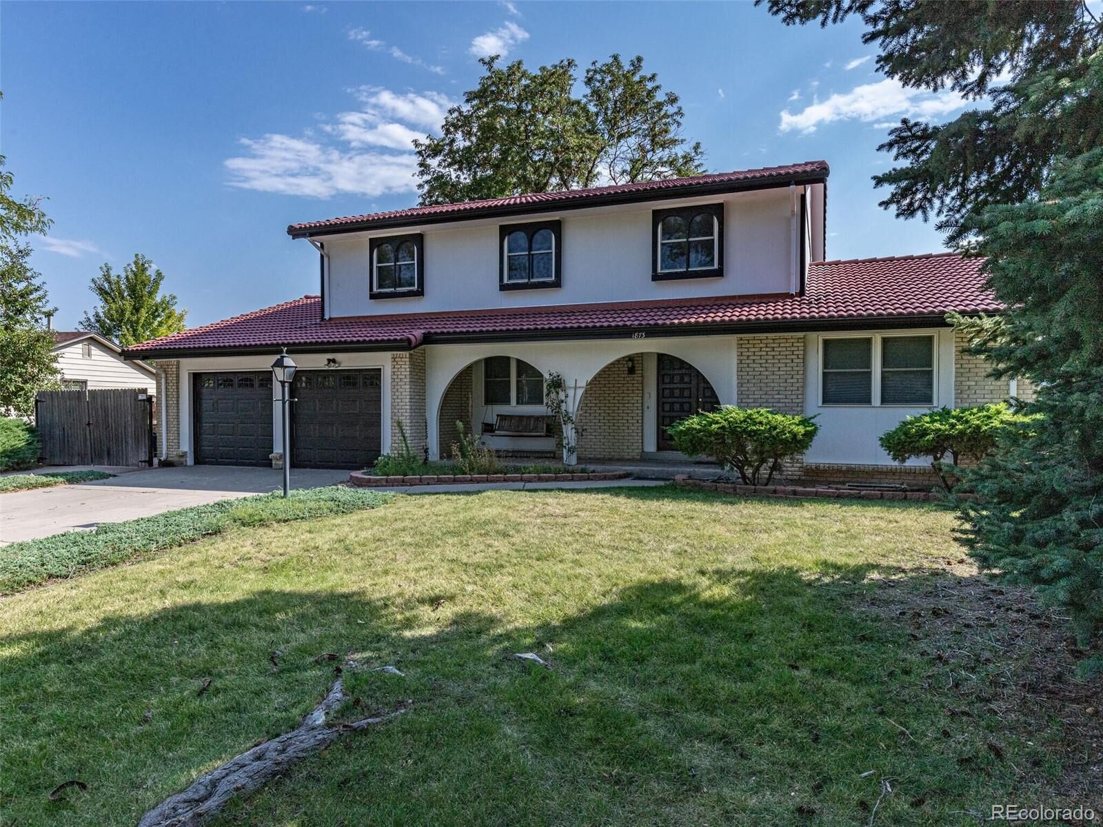Property Photo: 1873 S Robb Street CO 80232