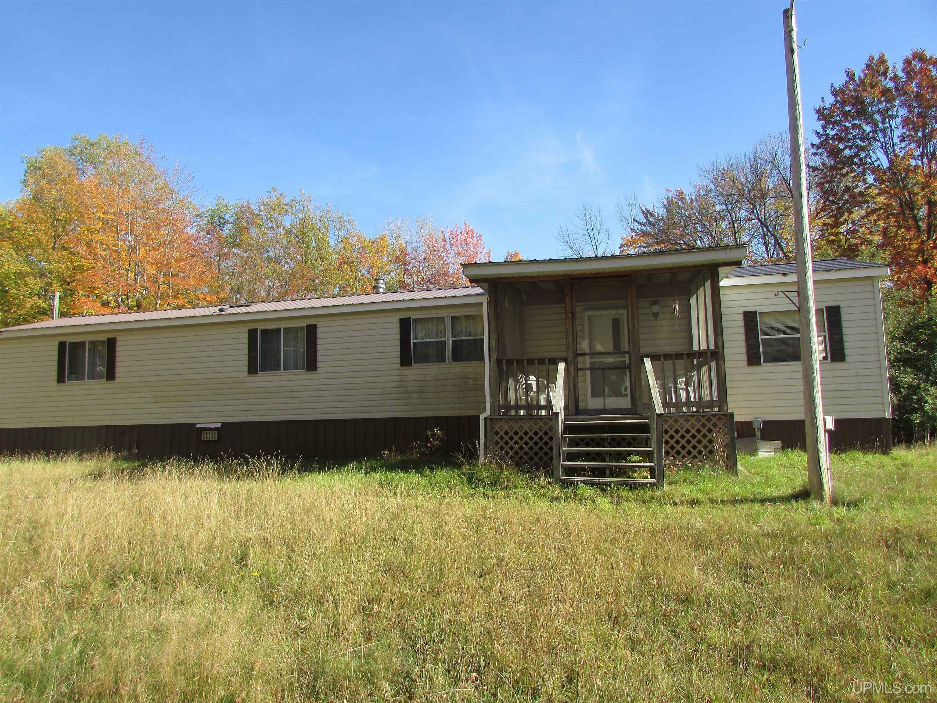 Property Photo:  18822 Aura Road  MI 49946 