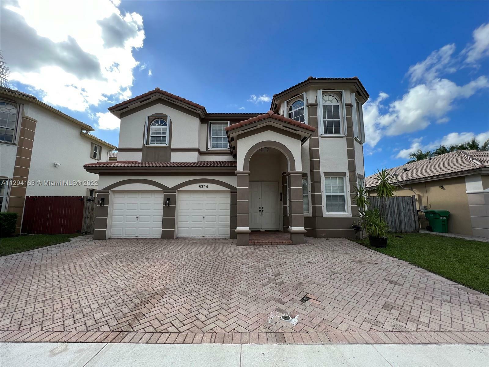 Property Photo: 8324 NW 115th Ct FL 33178