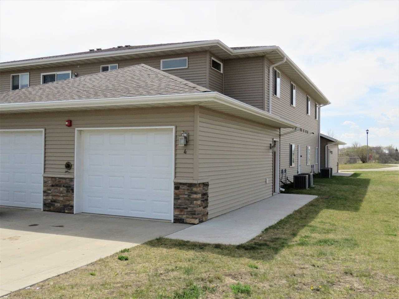 Property Photo: 19 43rd Ave SW Unit 4 SW ND 58701