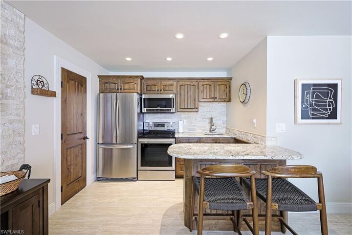 457 Tallwood St 402  Marco Island FL 34145 photo