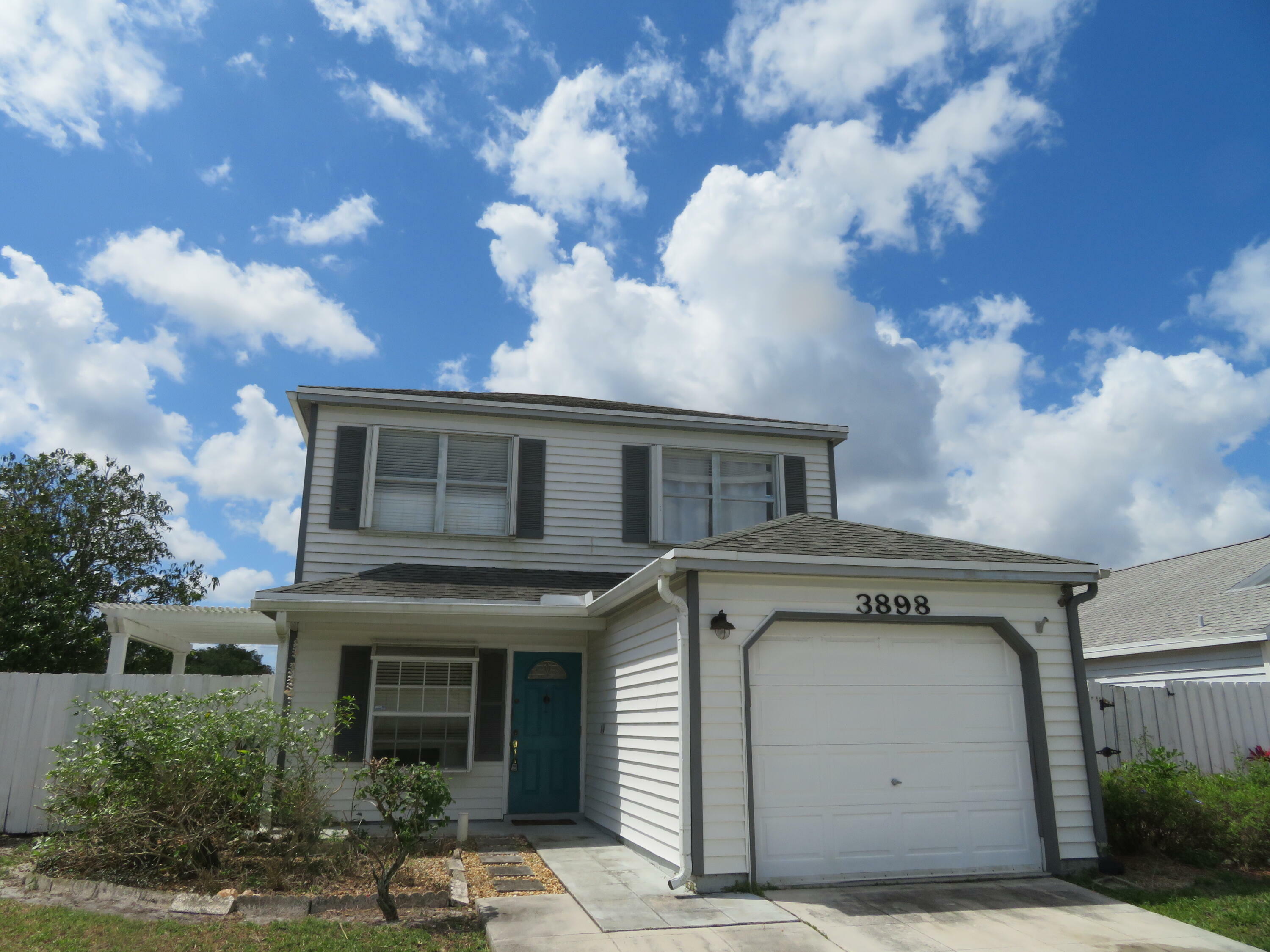 Property Photo: 3898 Circle Lake Drive FL 33417