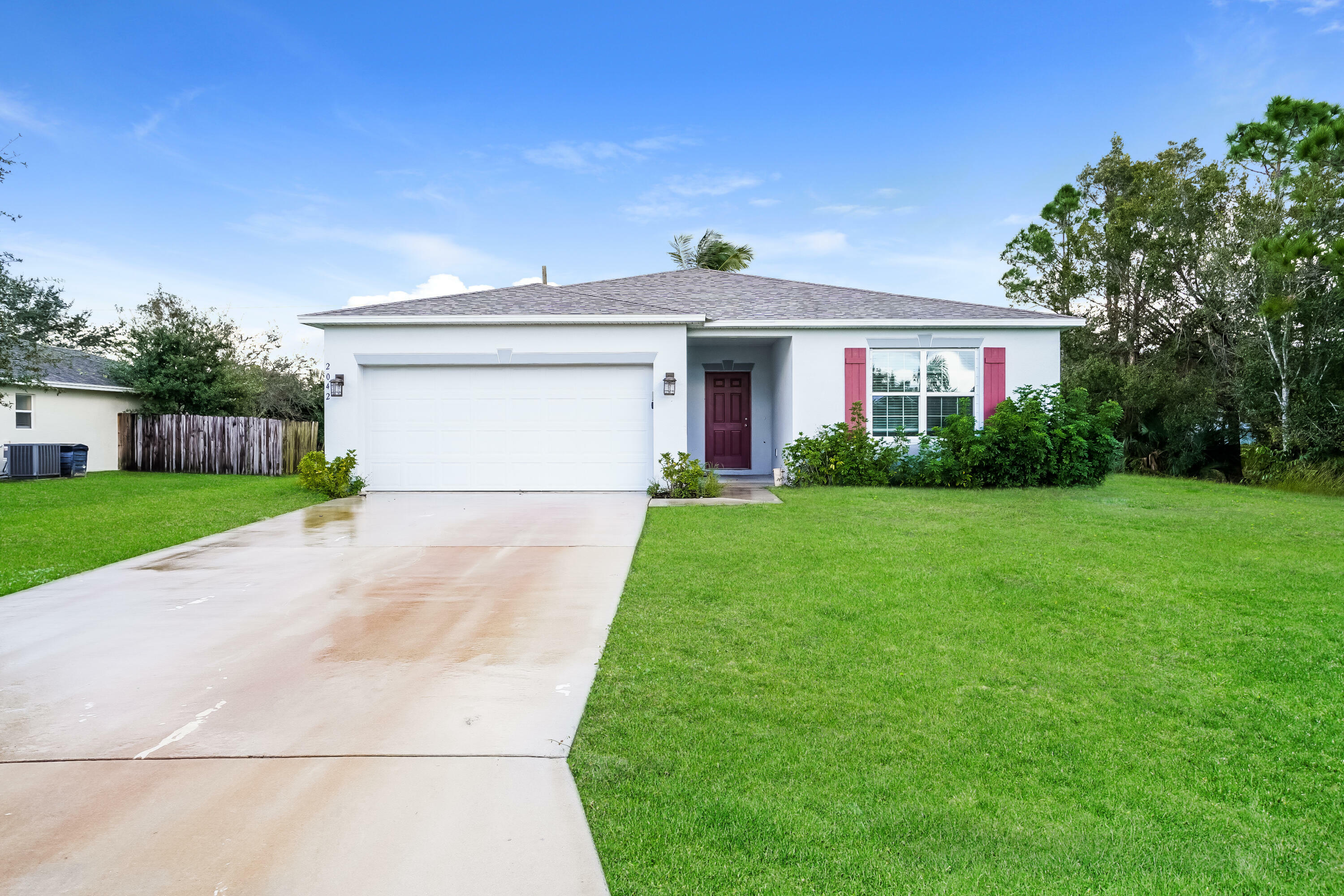 Property Photo:  2042 SW Aguero Street  FL 34953 