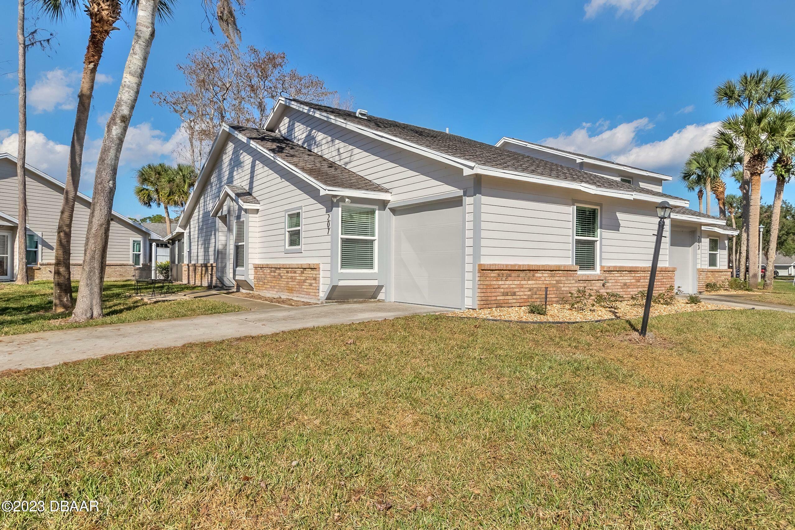 Property Photo:  207 Bob White Court  FL 32119 