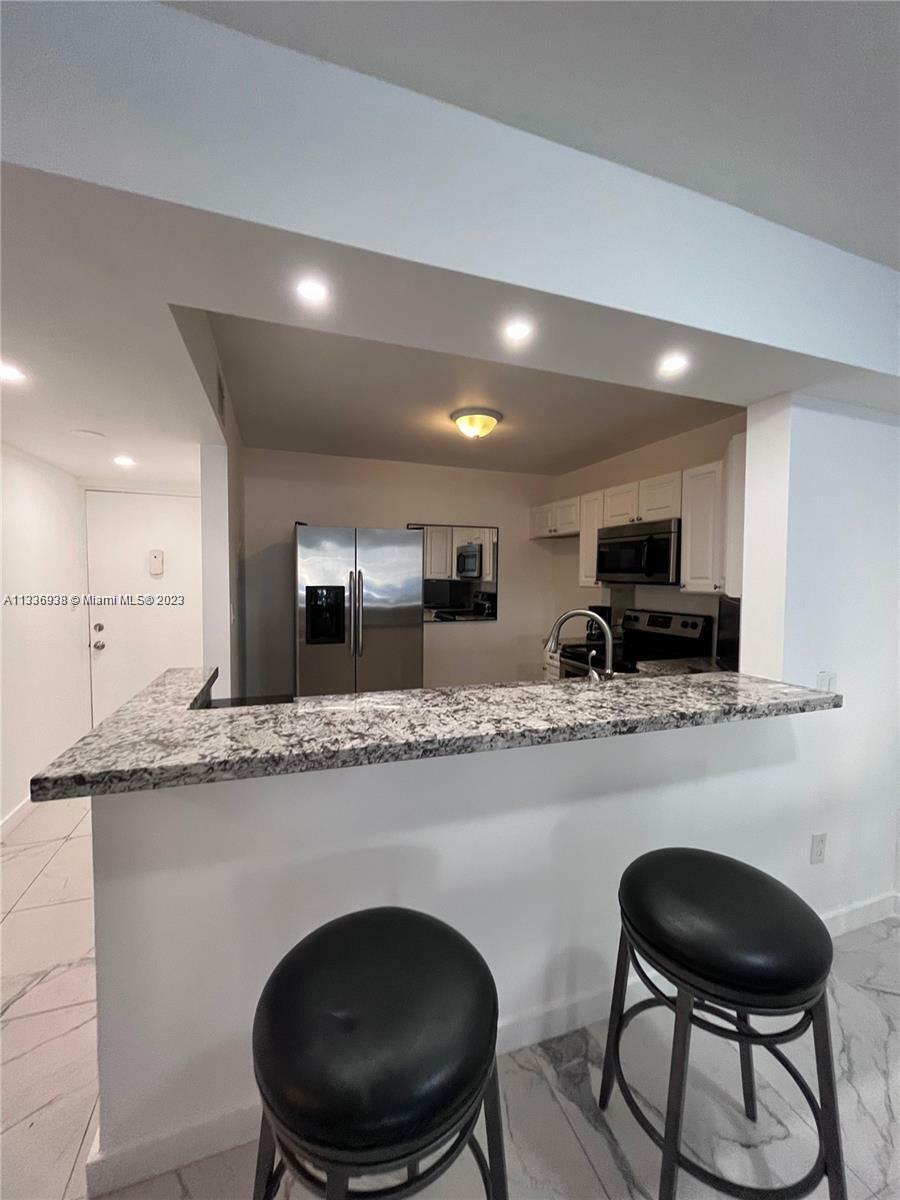 Property Photo: 11925 NE 2nd B102 FL 33161