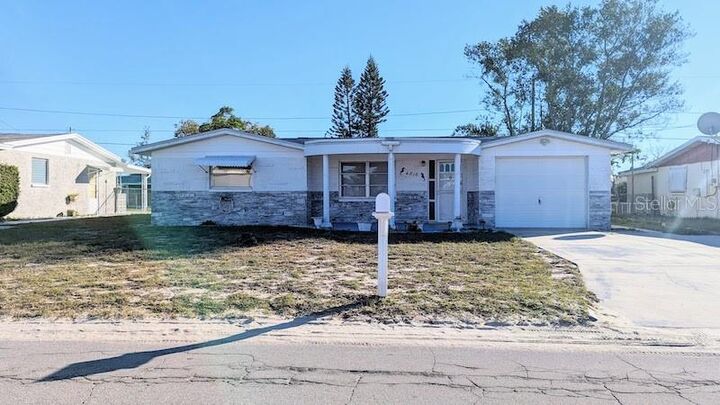 Property Photo:  4816 Panorama Avenue  FL 34690 