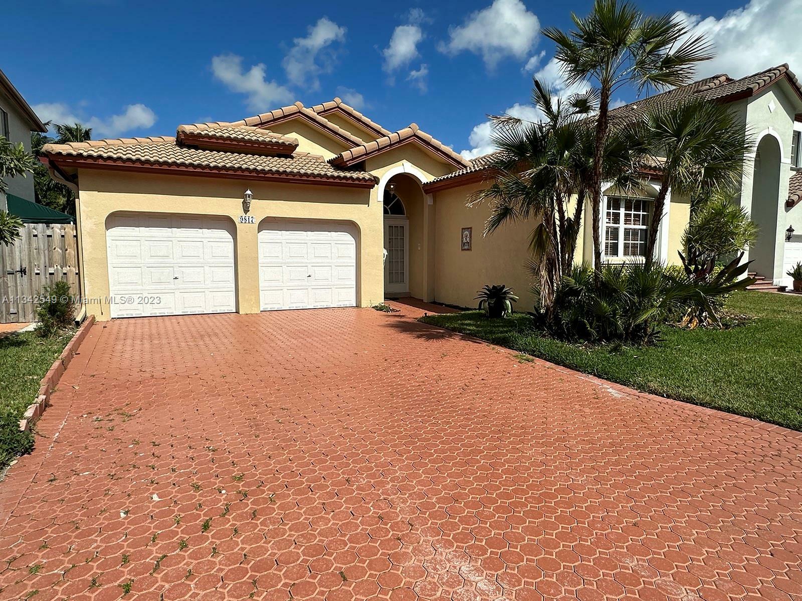 Property Photo:  9817 NW 29th St  FL 33172 