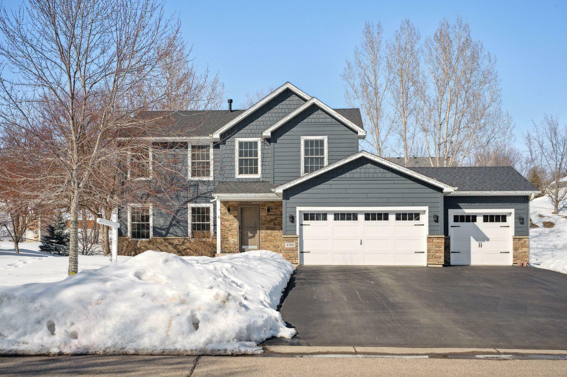 Property Photo:  8760 Woodland Curve  MN 55375 