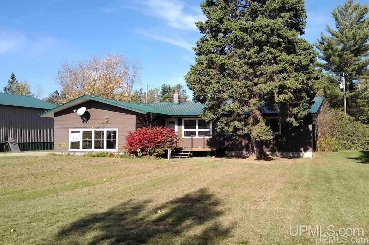 Property Photo:  E5114 M35  MI 49829 