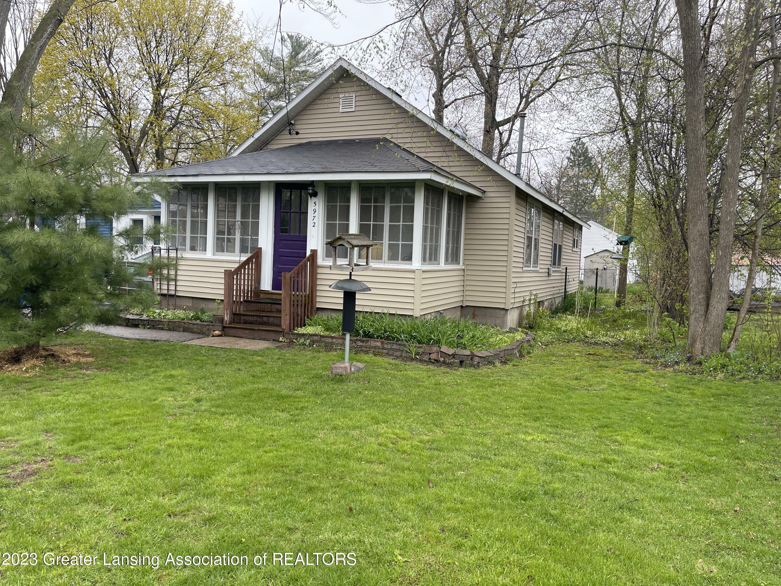 Property Photo:  5972 Cypress Street  MI 48840 