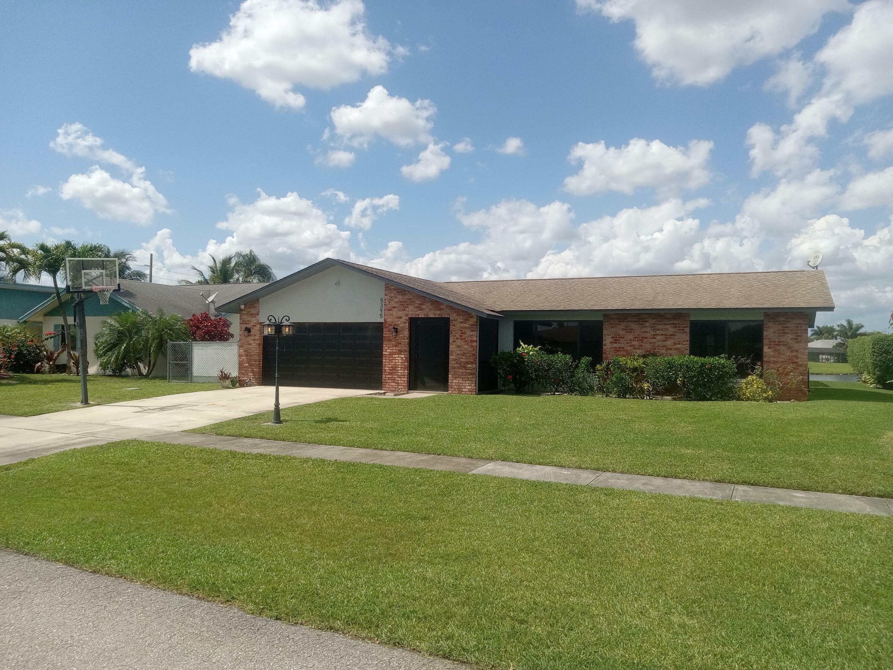 Property Photo:  5395 Plains Drive  FL 33463 