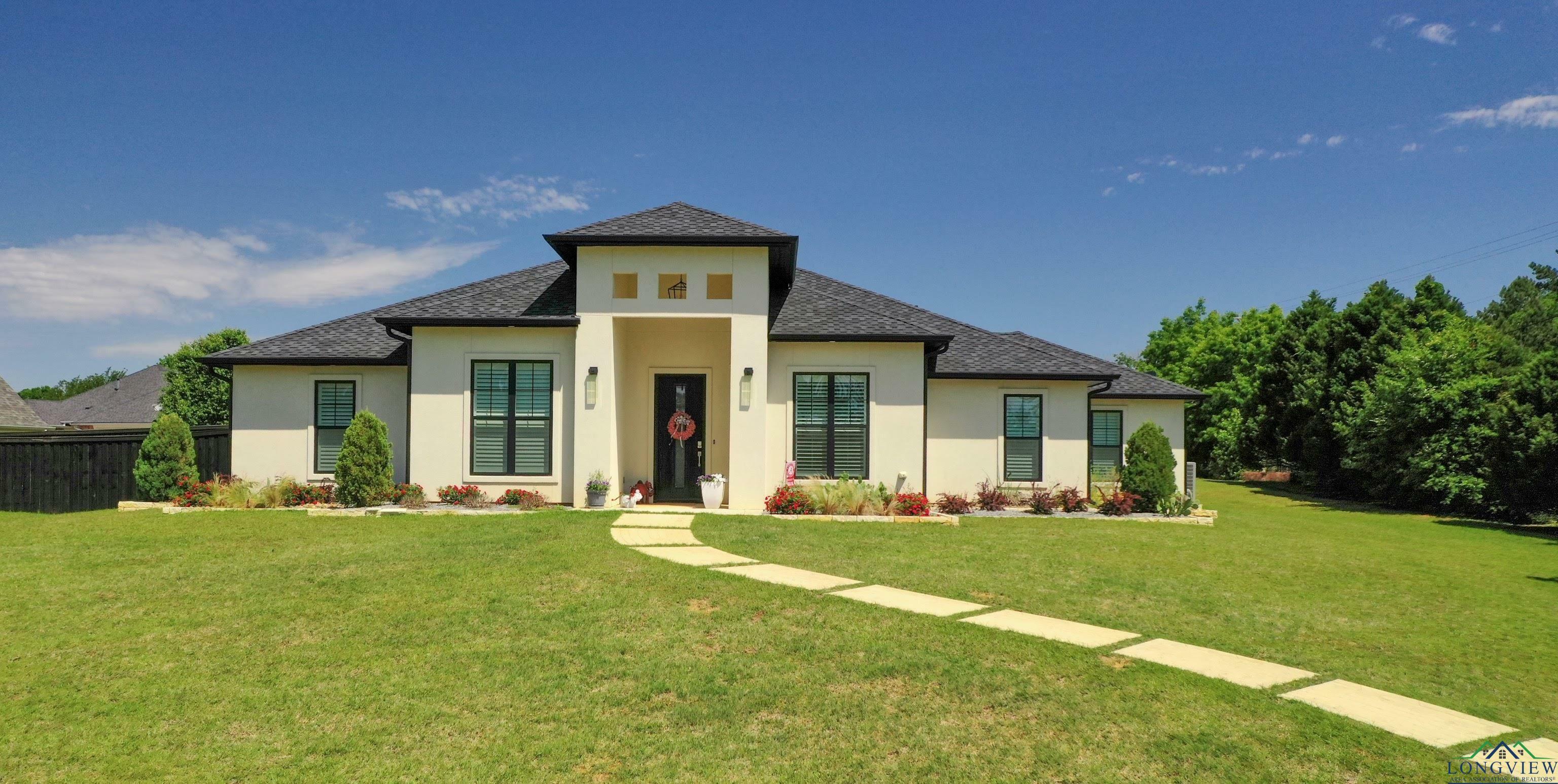 Property Photo:  209 Post Oak Dr  TX 75672-6220 