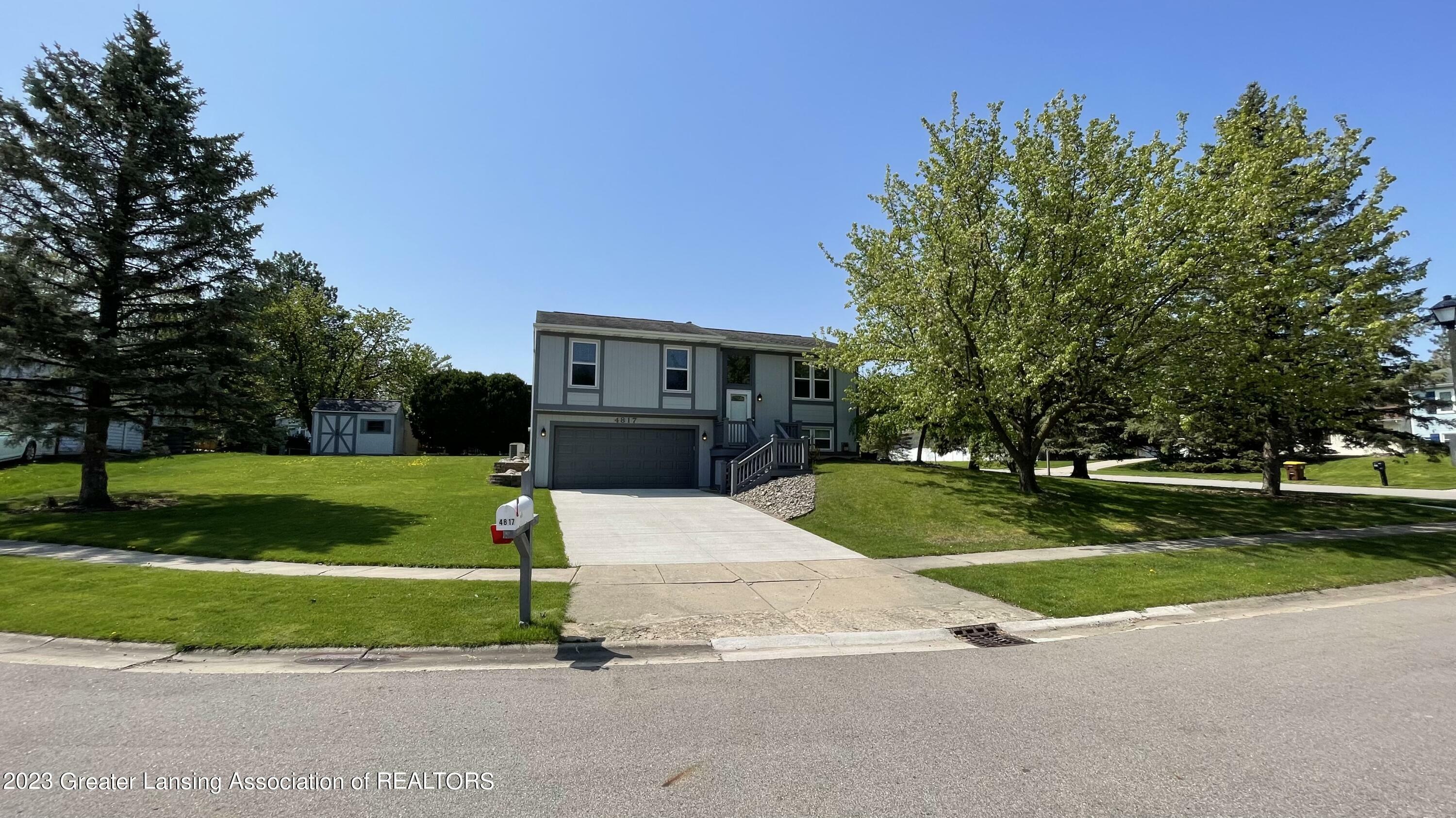 Property Photo:  4817 Malta Circle  MI 48917 