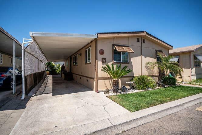 Property Photo:  812 W Clover Road 46  CA 95376 