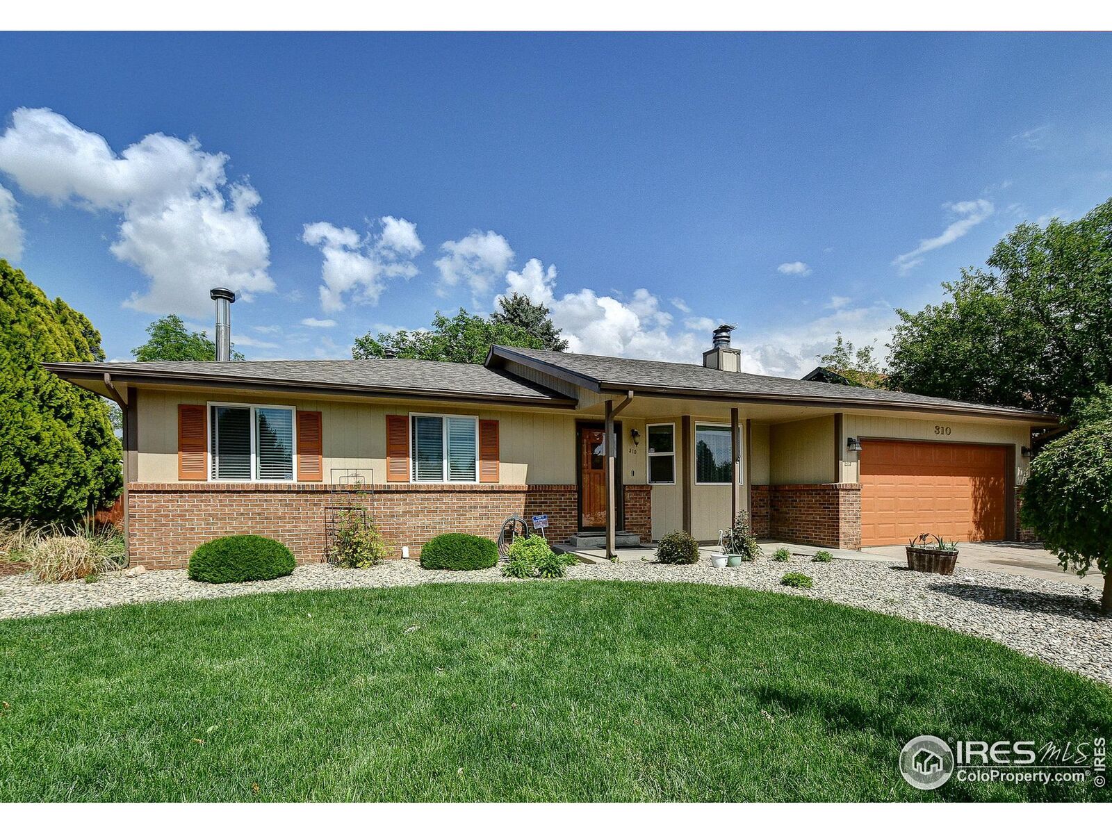 Property Photo:  310 46th Ave  CO 80634 