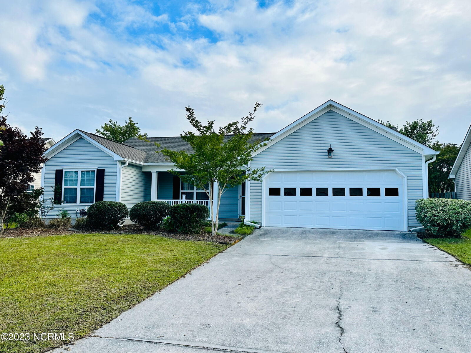 Property Photo: 213 Red Carnation Drive NC 28445