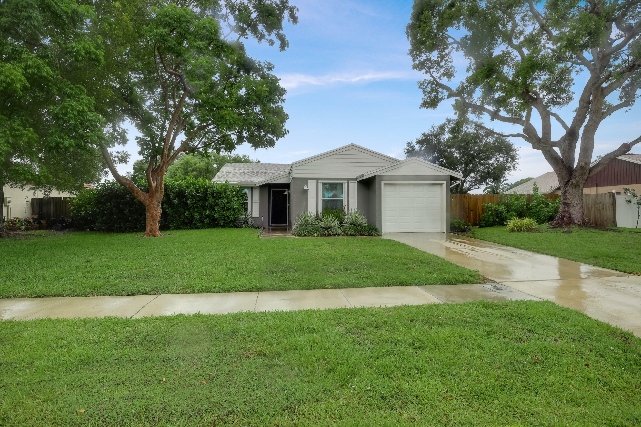 Property Photo: 8309 Little Beth Drive W FL 33472
