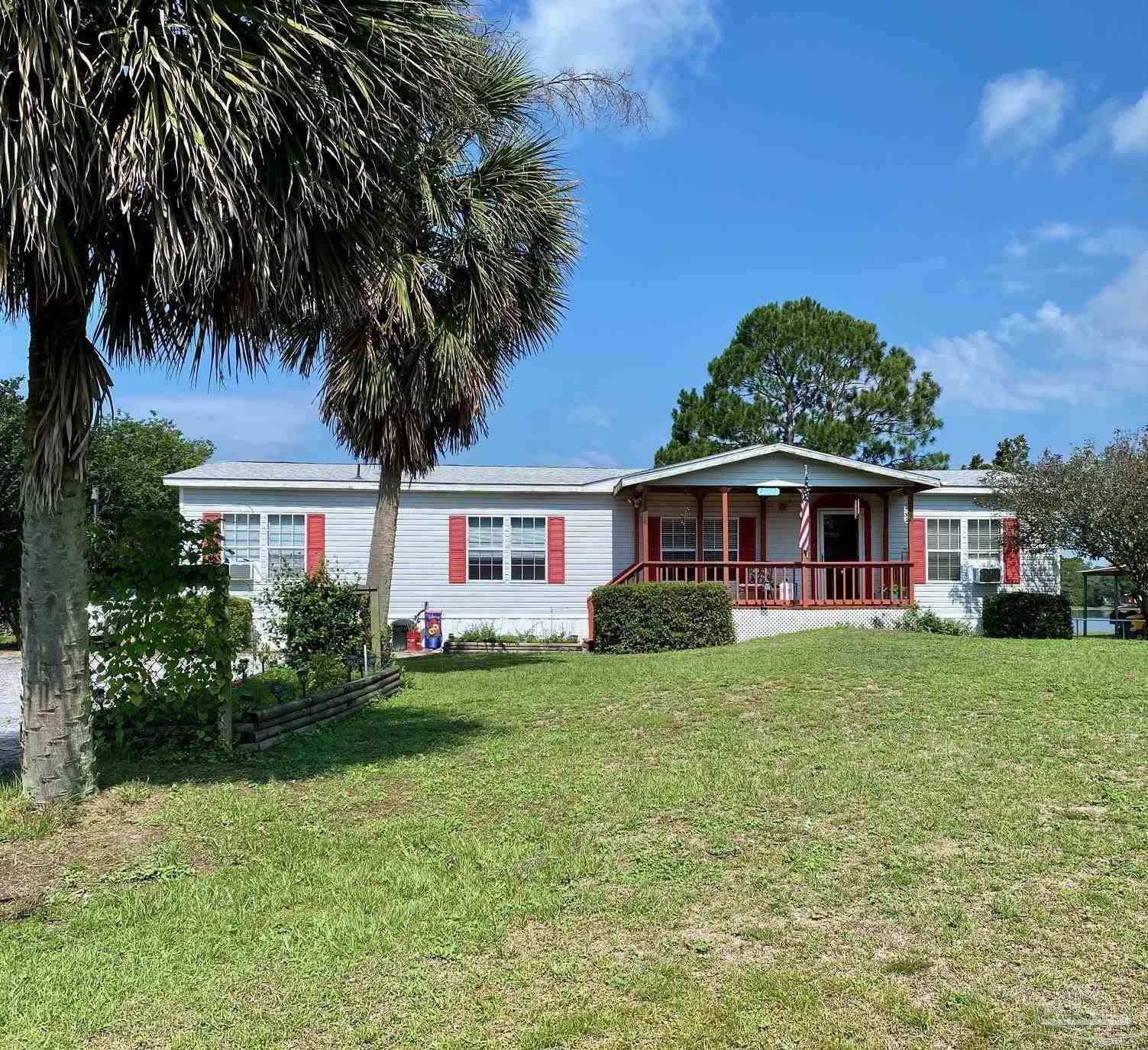 Property Photo: 8020 Twin Lake Dr FL 32583