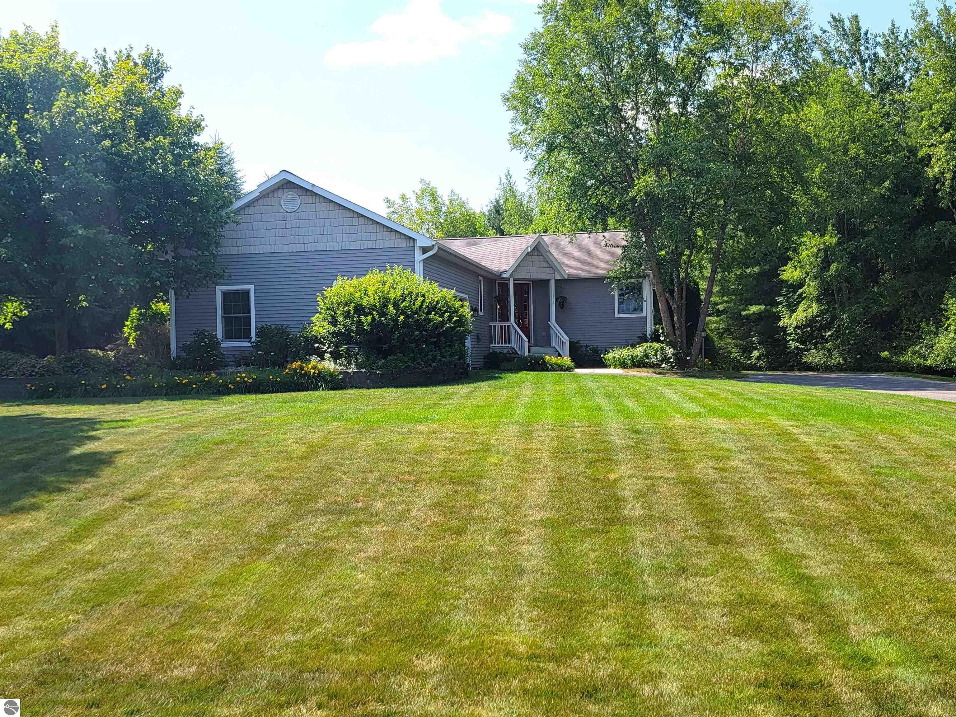 Property Photo:  5913 Village Drive  MI 49685 