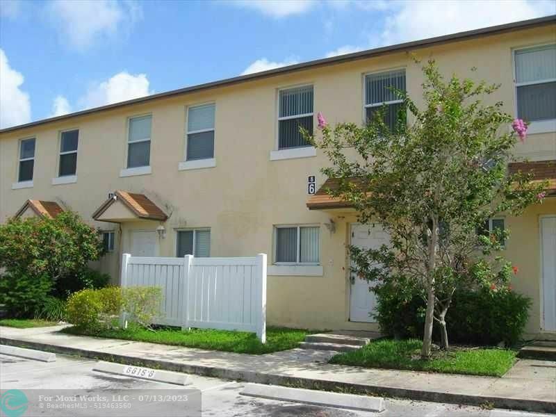 Property Photo:  6615 Winfield Blvd 6-8  FL 33063 