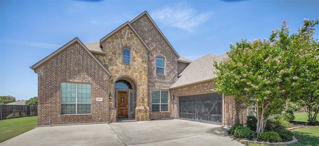 Property Photo: 1102 Hidden Oaks Drive TX 75098