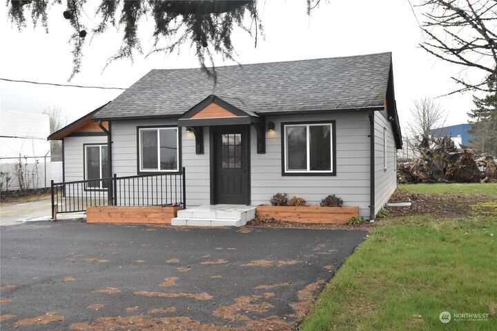 Property Photo:  10430 Portland Avenue E  WA 98445 