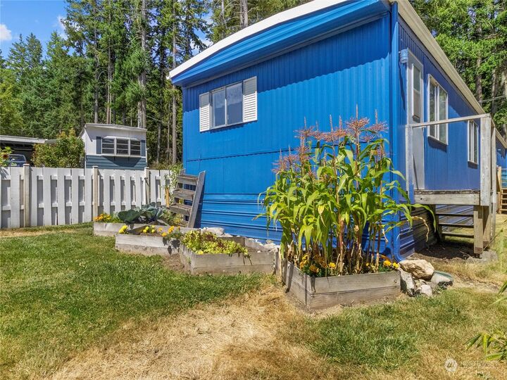 Property Photo: 9111 66th Avenue NW 112 WA 98332