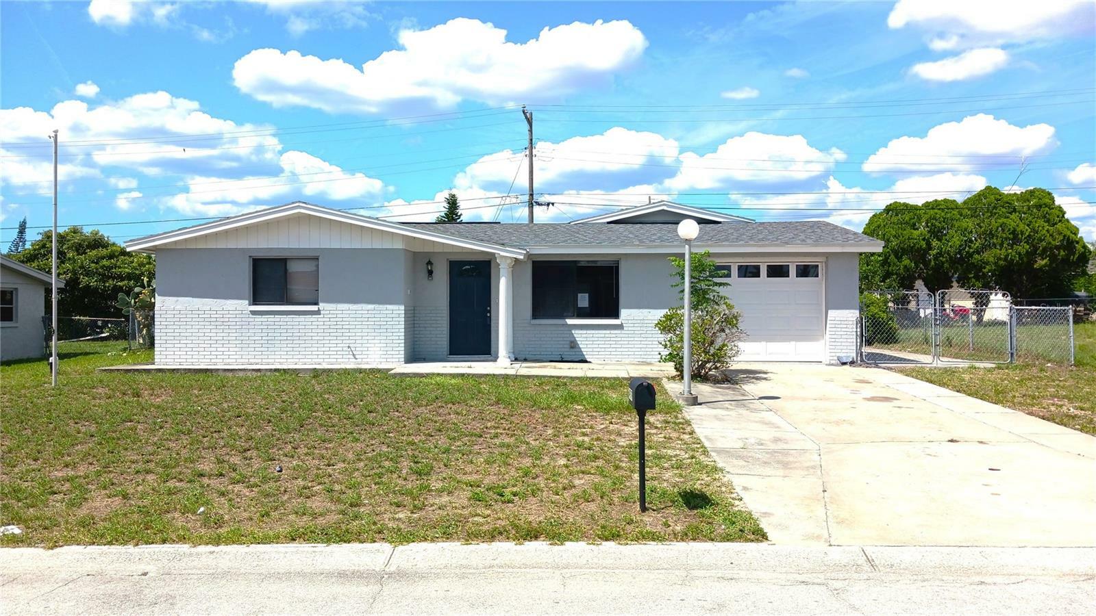 Property Photo:  4939 Zodiac Avenue  FL 34690 