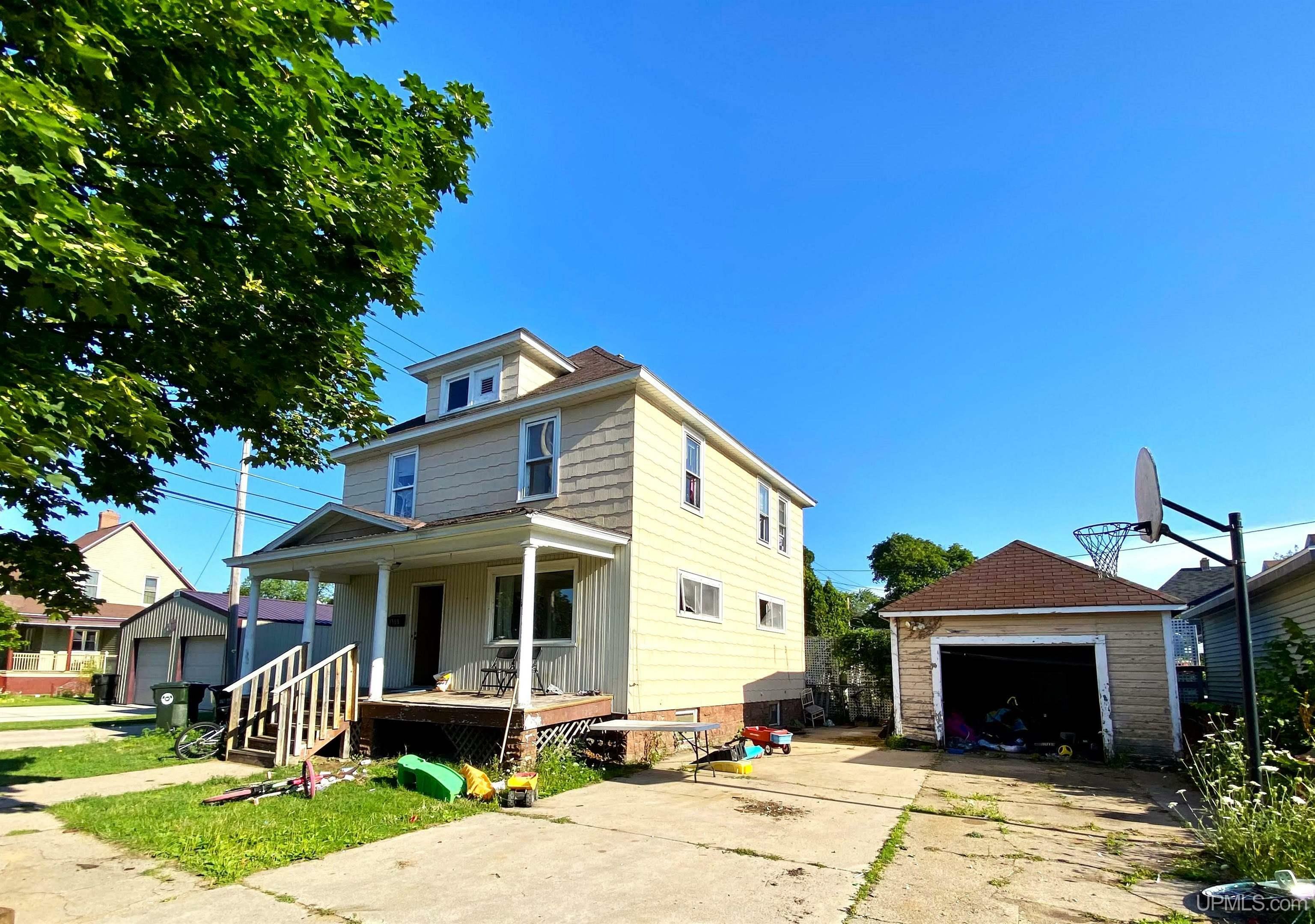 Property Photo:  1308 5th Ave S  MI 49829 