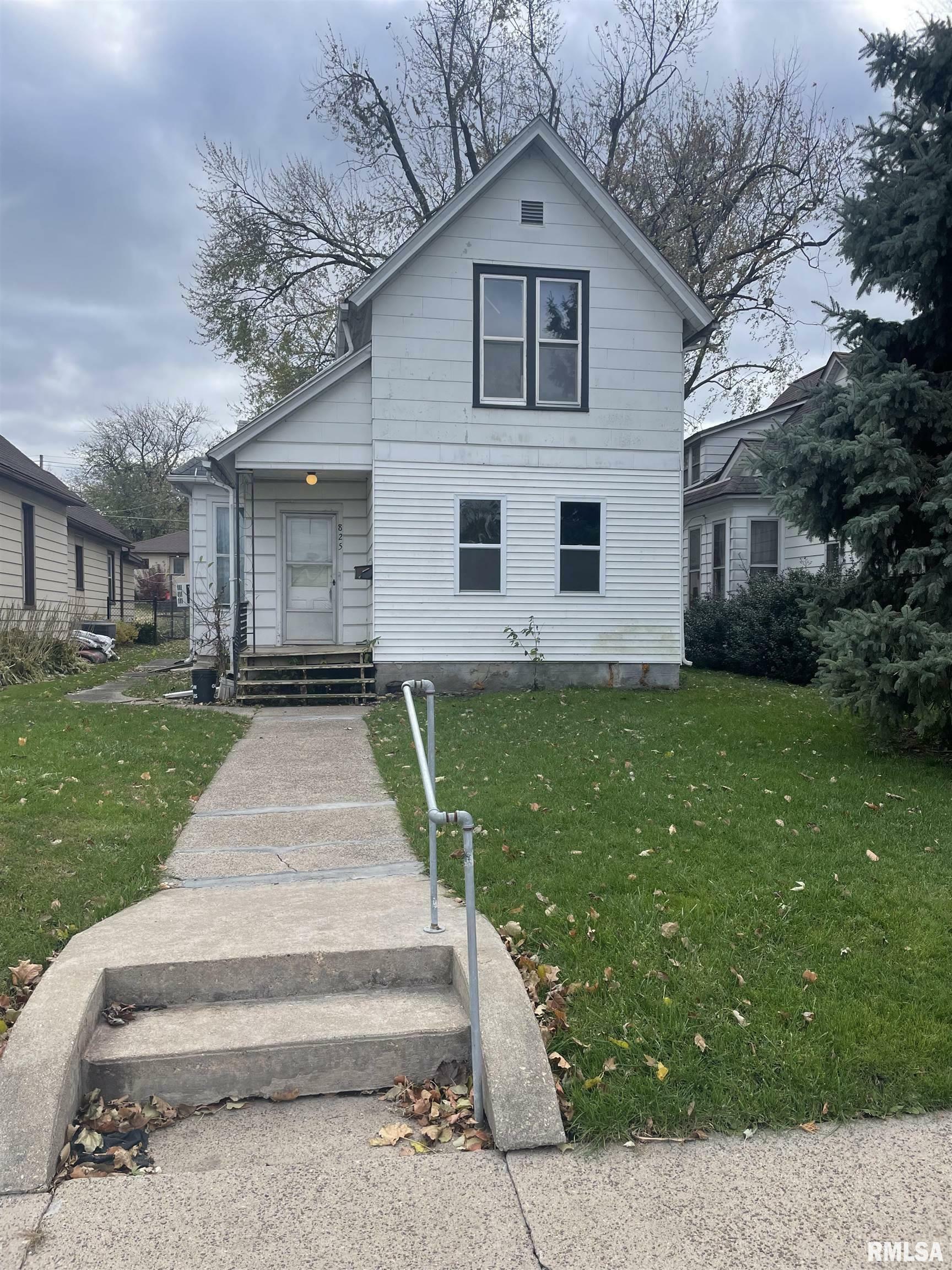 Property Photo:  825 S 11th Avenue  IA 52732 