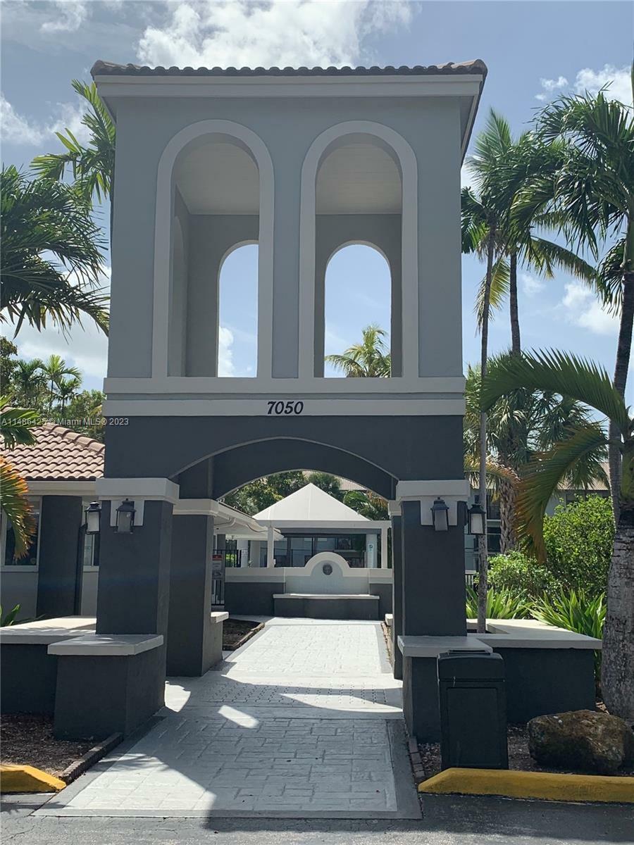 Property Photo: 7055 NW 179th St 202 FL 33015