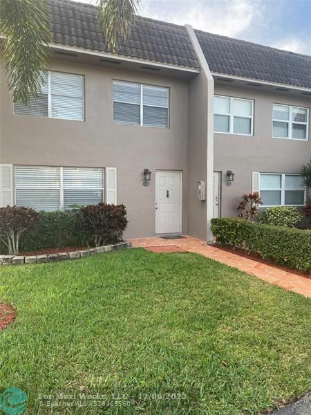 Property Photo:  9050 NW 28th St 118  FL 33065 