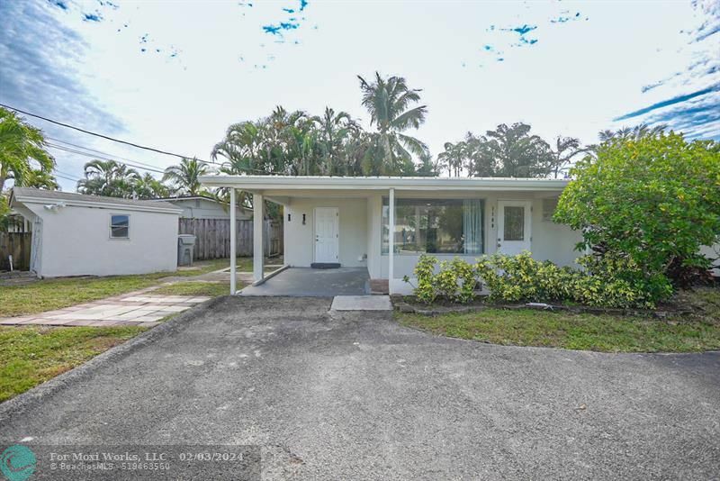 Property Photo:  1100 NE 3rd Street  FL 33060 