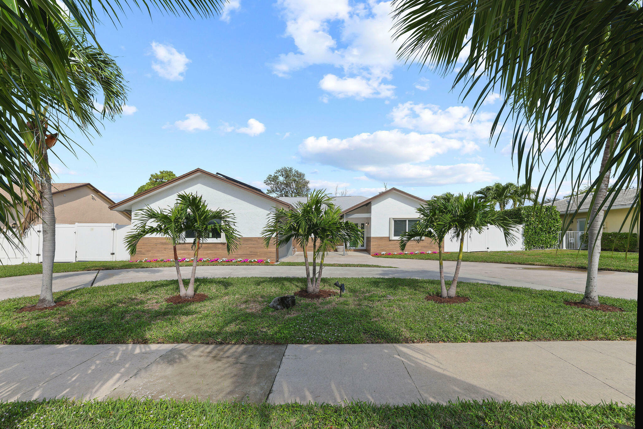 Property Photo:  441 NW 53rd Street  FL 33487 