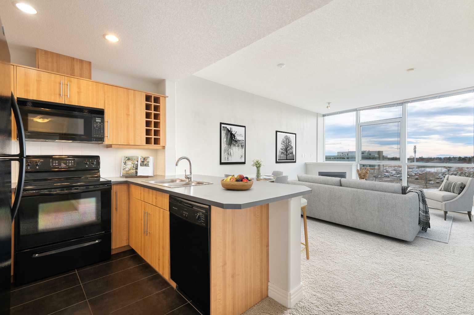Property Photo: 605, 55 Spruce Place SW 605 AB T3C 3X5