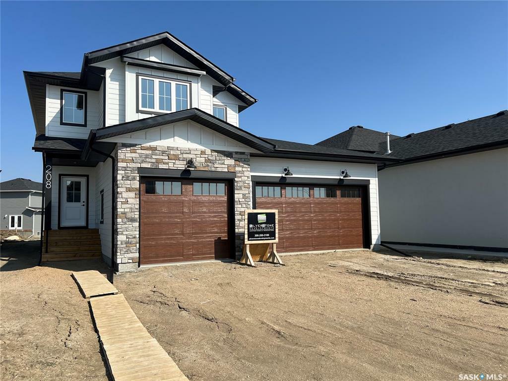 Property Photo:  208 Woolf Place  SK S7W 0Z6 