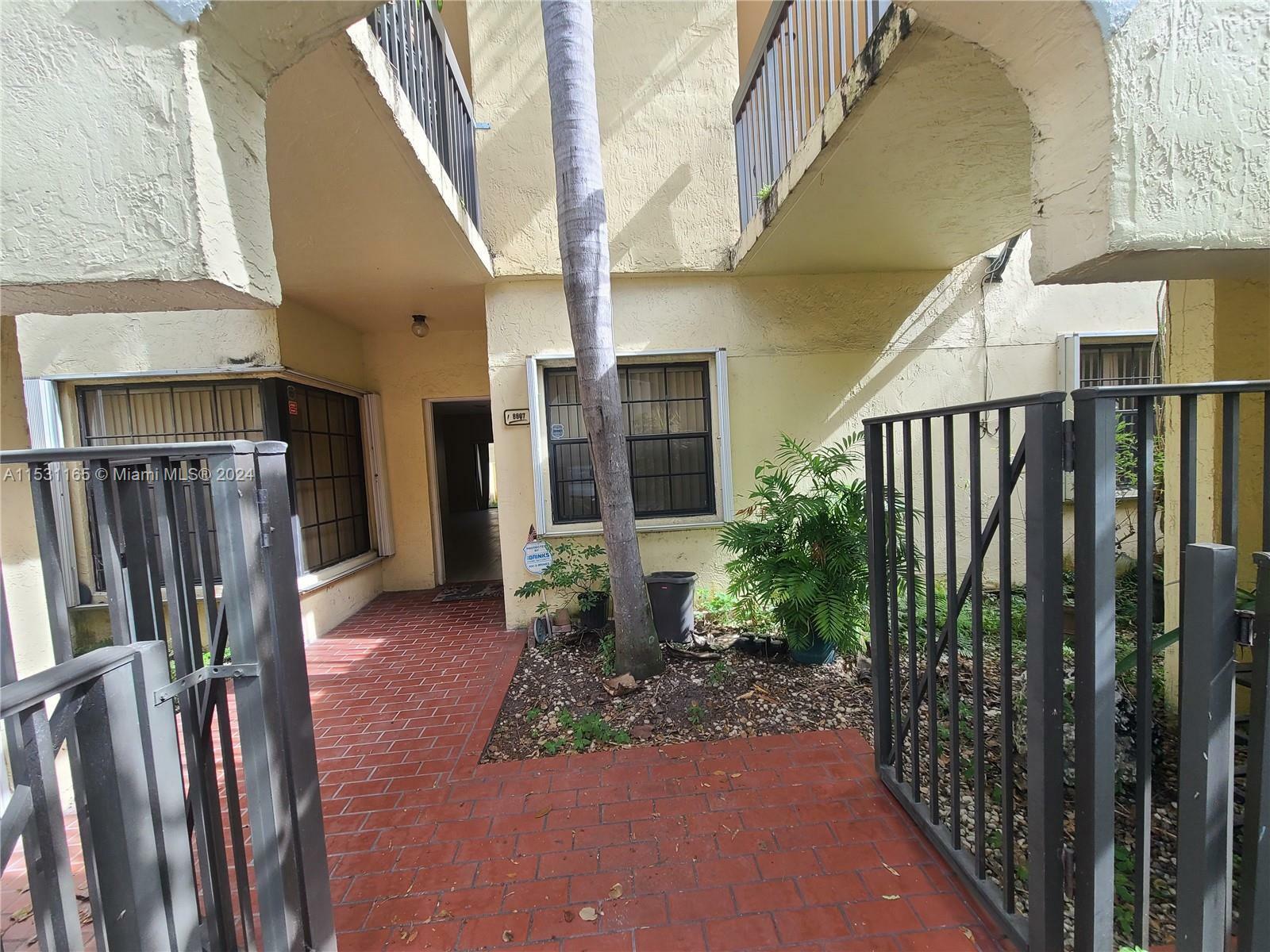 Property Photo:  8807 SW 130th Pl 102  FL 33186 