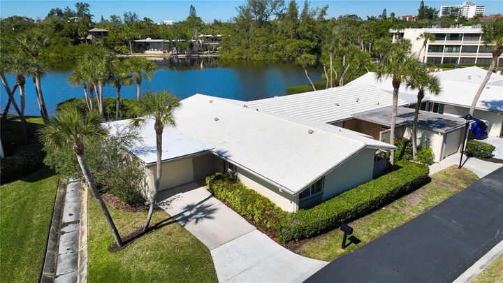 Property Photo:  105 Whispering Sands Drive V-48  FL 34242 