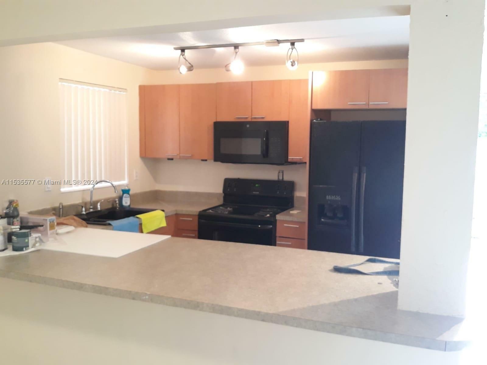 Property Photo:  9960 SW 88th St 614-6  FL 33176 