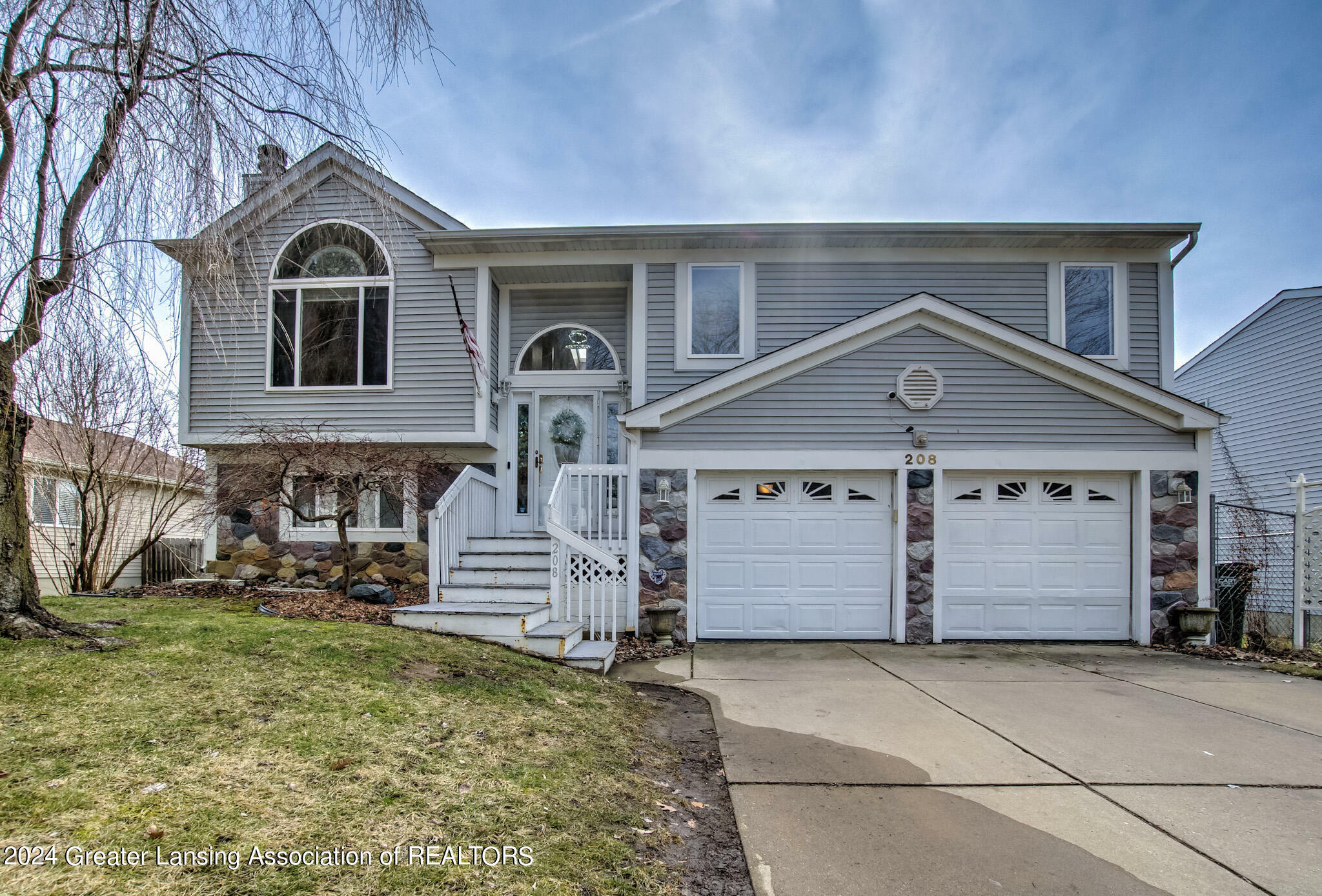 Property Photo:  208 Olympia Drive  MI 48911 