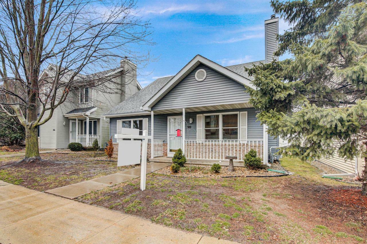 Property Photo:  310 Harbour Town Drive  WI 53717 
