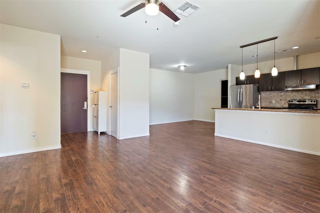 Property Photo:  1100 W Trinity Mills Road 2004  TX 75006 