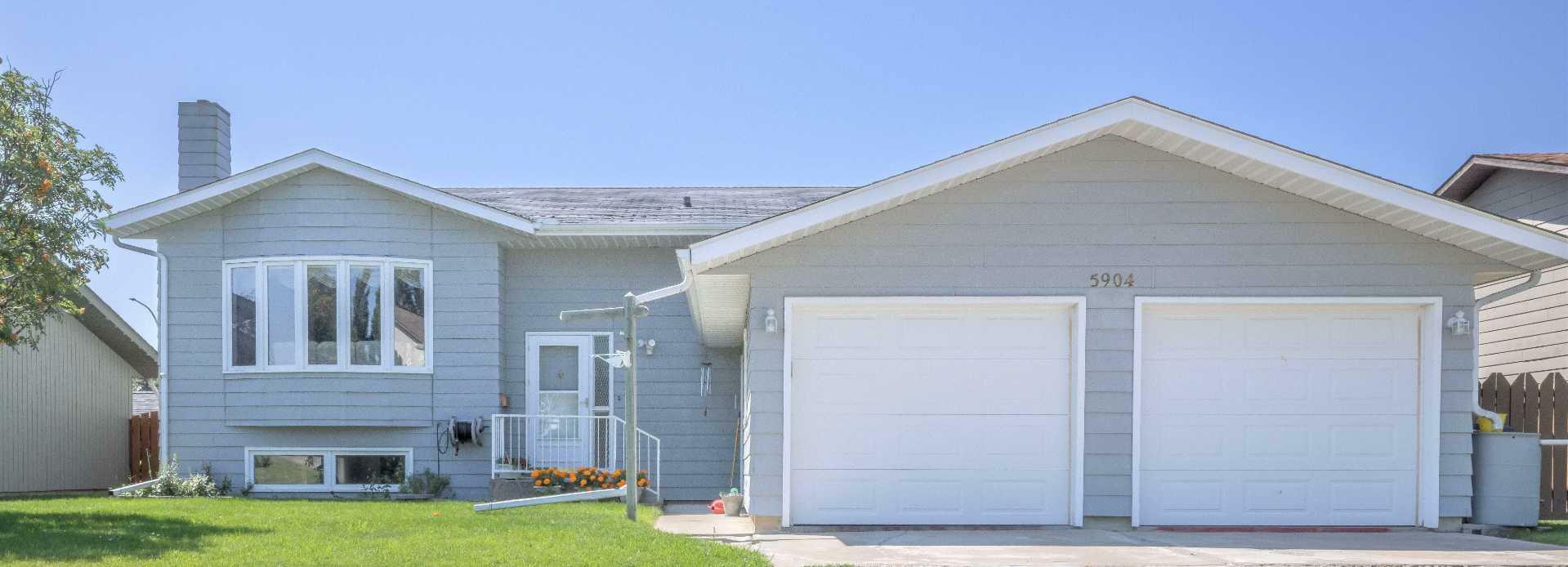 Property Photo: 5904 59 Street AB T4T 1K1