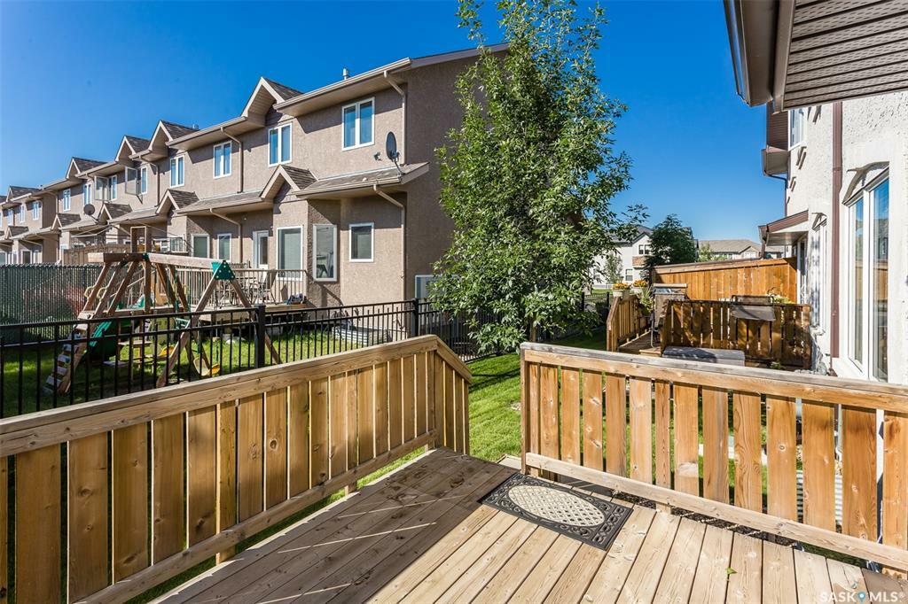 Property Photo:  106 Baillie Cove 12  SK S7T 0B8 