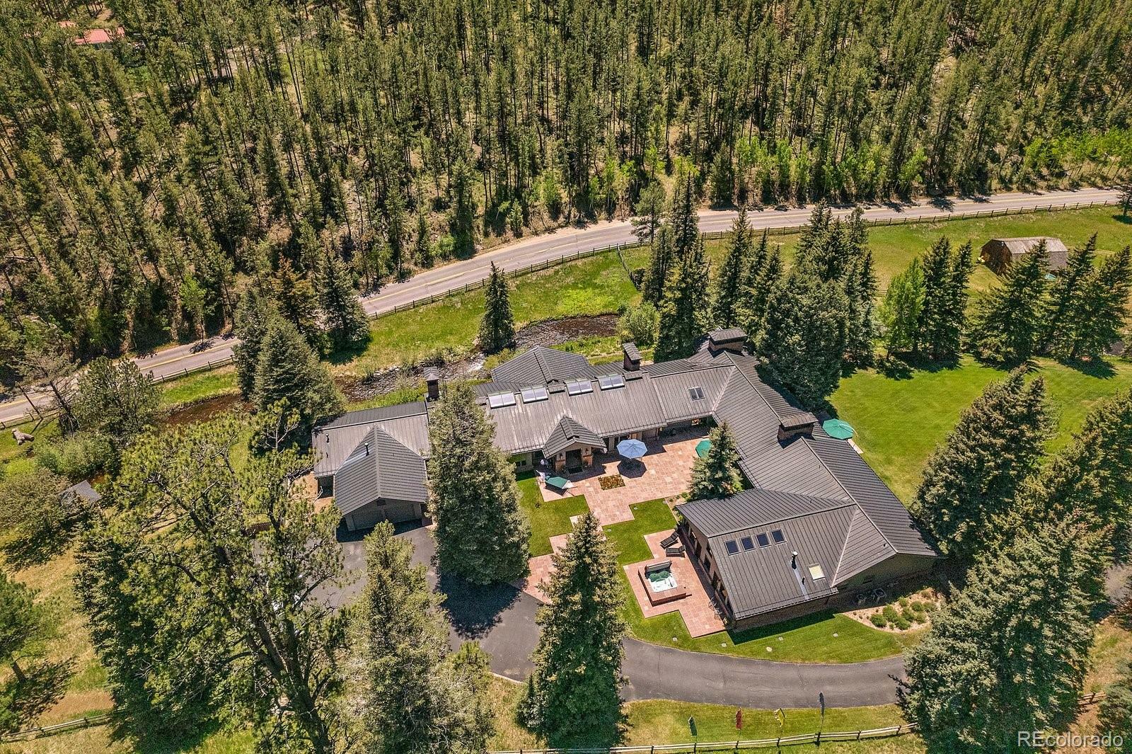 Property Photo:  32453 Upper Bear Creek Road  CO 80439 