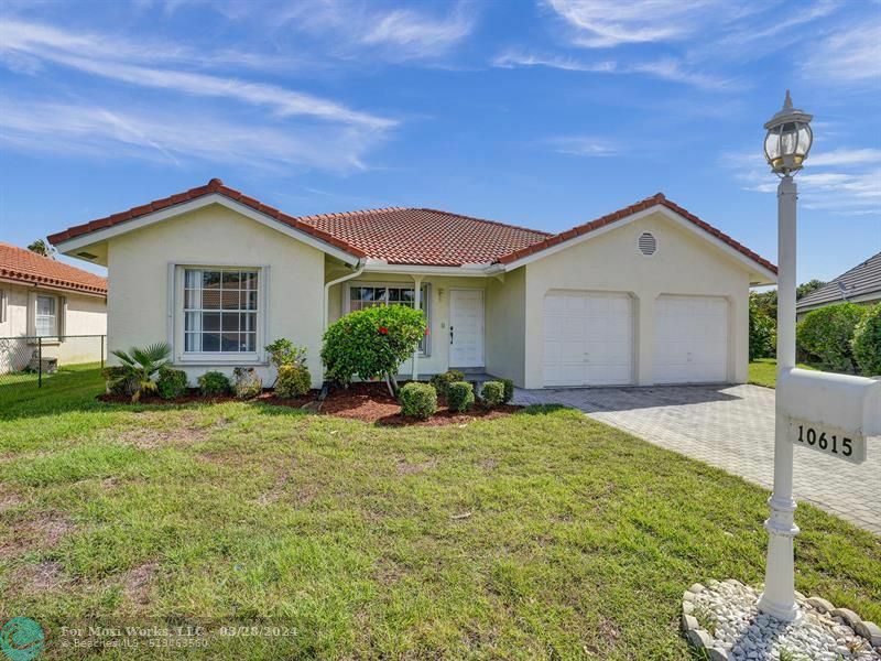 Property Photo:  10615 NW 16th Ct  FL 33071 