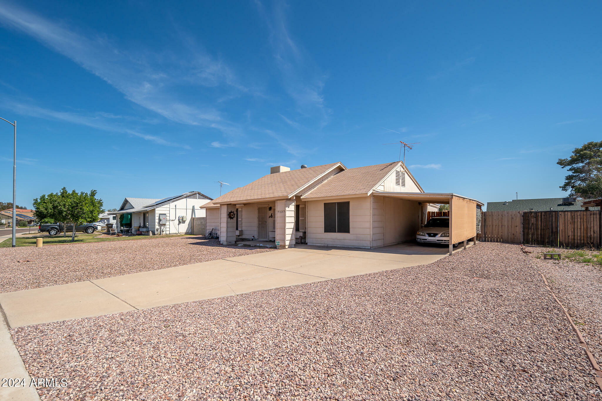 Property Photo:  7137 W Mercer Lane  AZ 85345 