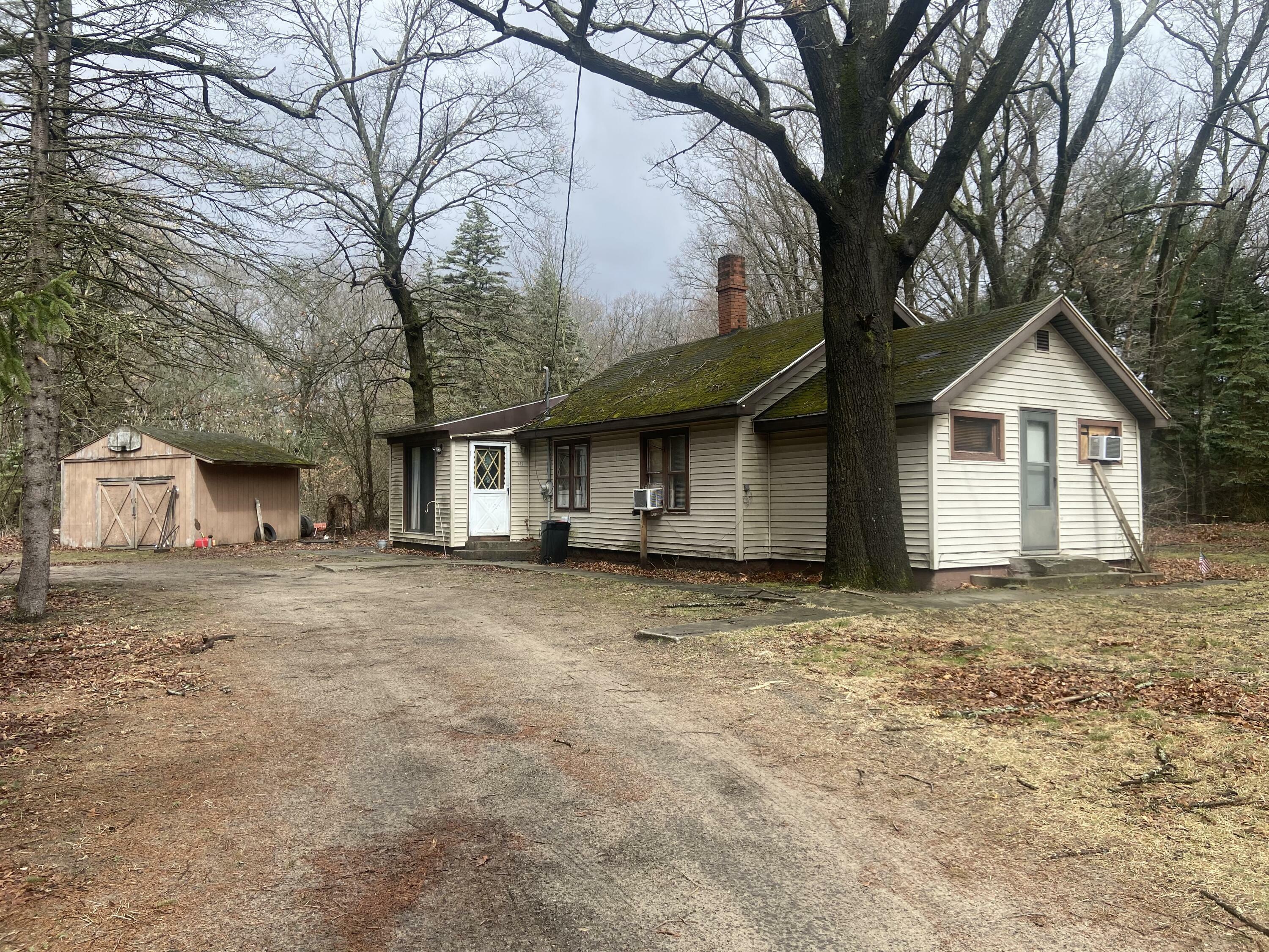 Property Photo:  50 N Sheridan Drive  MI 49442 