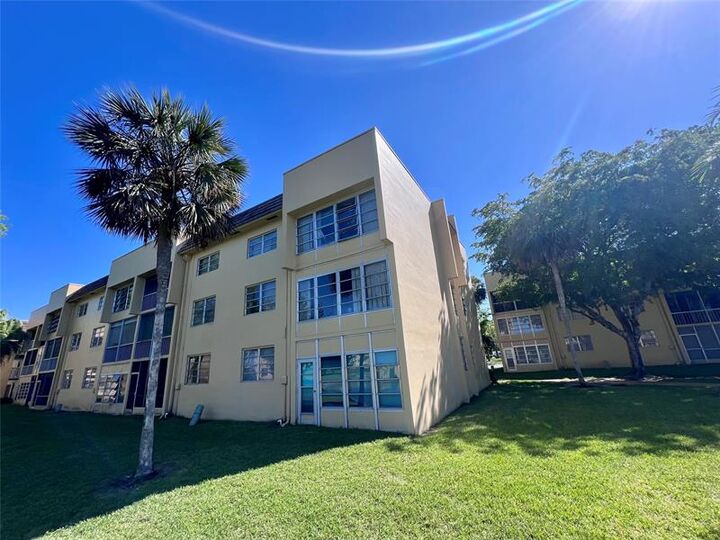 Property Photo: 5980 NW 64th Ave 201 FL 33319