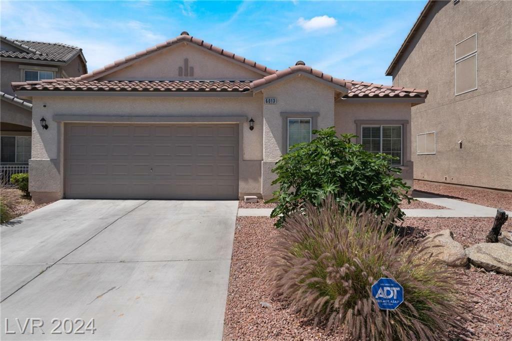 Property Photo:  6013 Leaping Foal Street  NV 89081 
